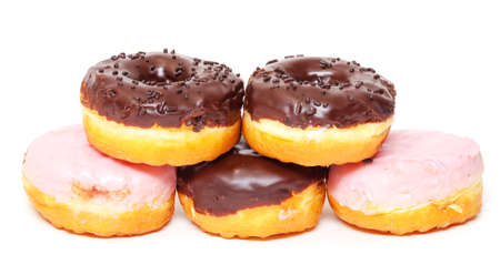 Chocolate Donuts Stacked on white backgroundの写真素材