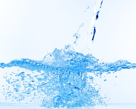 Stream of Water Falling into the Water, closeup