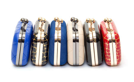 Set of fashionable female handbags on white の写真素材