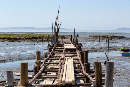 Very Old Dilapidated Pier in Fisherman Village, Comporta, Portugalの写真素材