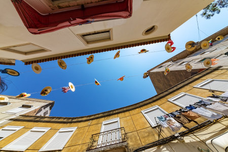 City Streets Decorated with Straw Hats, wide angle