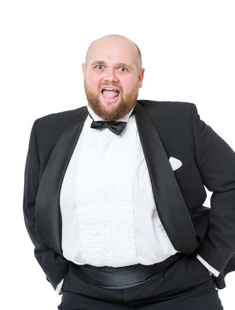 Jolly Fat Man in Tuxedo and Bow tie Shows Emotions, on white backgroundの写真素材