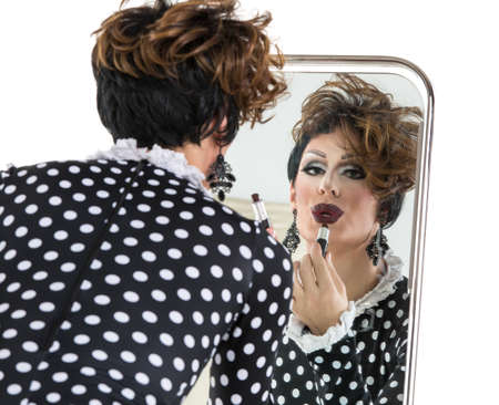 Drag Queen use Lipstick near Mirror, on white backgroundの写真素材