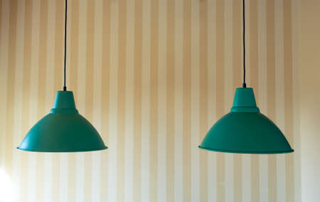 Two Modern Ceiling Lamp for Interior Decoration, on striped wall backgroundの写真素材