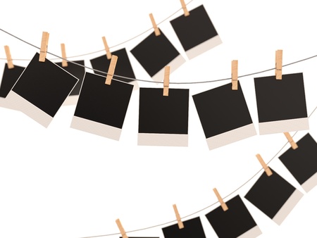 Blank photo frames on a rope. 3D renderの写真素材