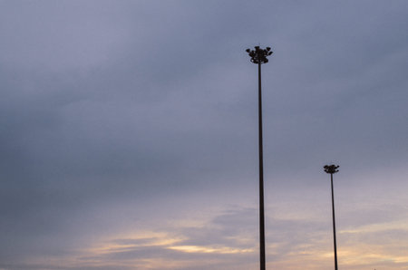 Electricity poles on the roadの写真素材