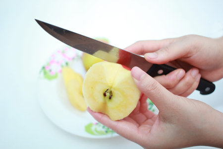 Red apple with peelの写真素材