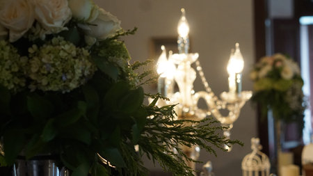 Chandelier Decoration on a Stand , Flowers in Foreground
