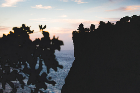 Temple Pura Uluwatu, Bali at sunset, Indonesiaの写真素材