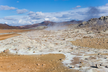 Hot Mud Pots and great landscape in the Geothermal Area Hverir, Iceland.の写真素材