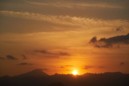 Oman sunset sea mountainsの写真素材