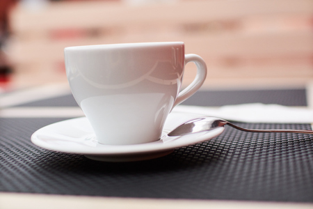 cup of tea on a table in a cafeの写真素材