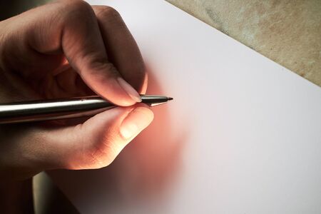 write with a pen in a notebookの写真素材