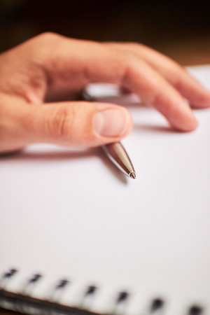 write with a pen in a notebookの写真素材