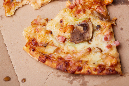 pizza with ham and mushroomsの写真素材