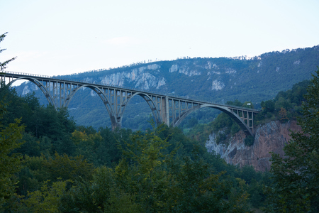 bridge over the river in the mountains of Montenegroの写真素材