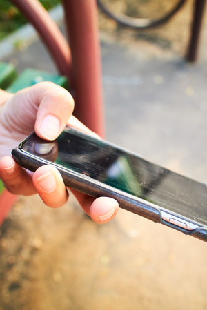 phone in a female handの写真素材