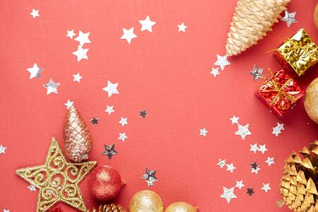 Christmas decoration on a red backgroundの写真素材