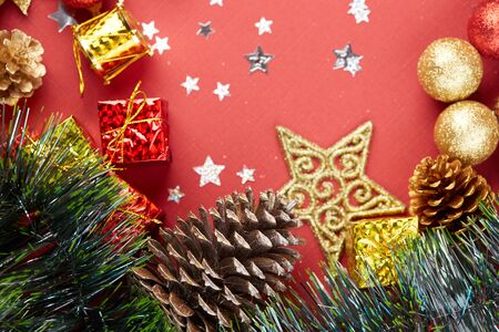 Christmas decoration on a red backgroundの写真素材