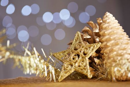 Christmas decorations on a background of lights and glareの写真素材