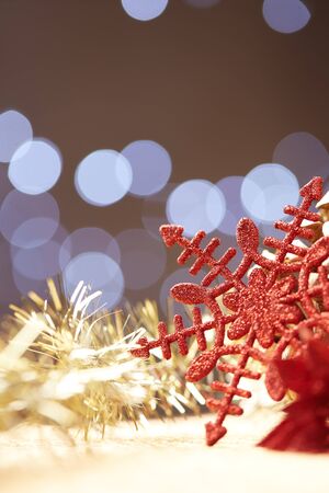 Christmas decorations on a background of lights and glareの写真素材