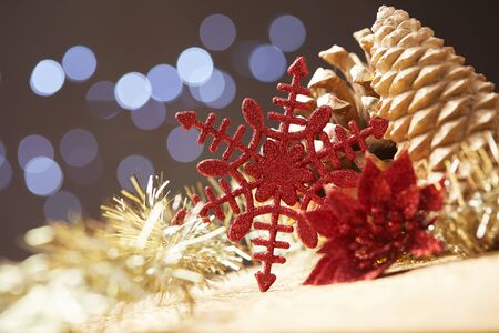 Christmas decorations on a background of lights and glareの写真素材