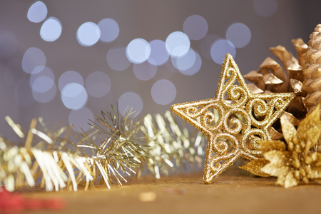 Christmas decorations on a background of lights and glareの写真素材
