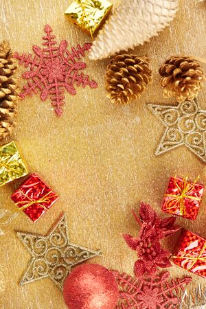 Christmas decorations on a gold backgroundの写真素材