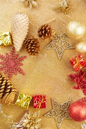 Christmas decorations on a gold backgroundの写真素材
