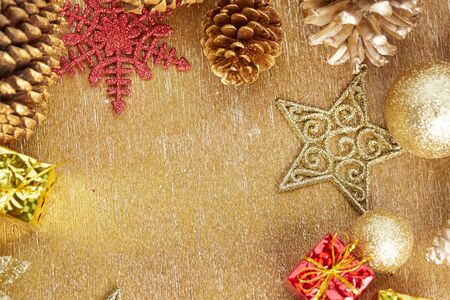 Christmas decorations on a gold backgroundの写真素材