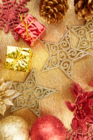 Christmas decorations on a gold backgroundの写真素材