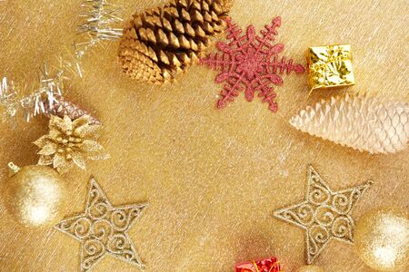 Christmas decorations on a gold backgroundの写真素材