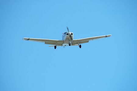 Light plane landing, Palo Alto Airport, Californiaの写真素材