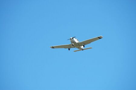 Light plane landing, Palo Alto Airport, Californiaの写真素材