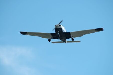 Light plane landing, Palo Alto Airport, Californiaの写真素材