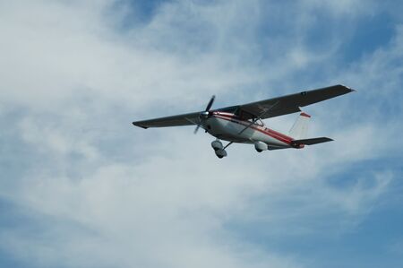 Light plane landing, Palo Alto Airport, Californiaの写真素材