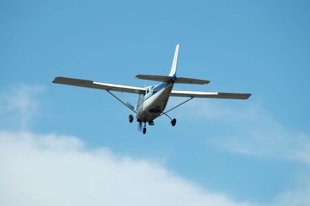 Light plane landing, Palo Alto Airport, Californiaの写真素材