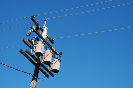 Electric utility pole, transformers and wiresの写真素材