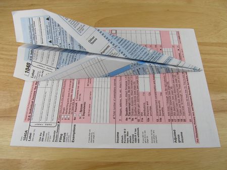 Tax form paper airplaneの写真素材