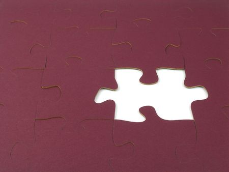 Blank jigsaw puzzle missing one pieceの写真素材