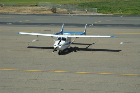 A light plane parked at a municipal airport, Concord, California