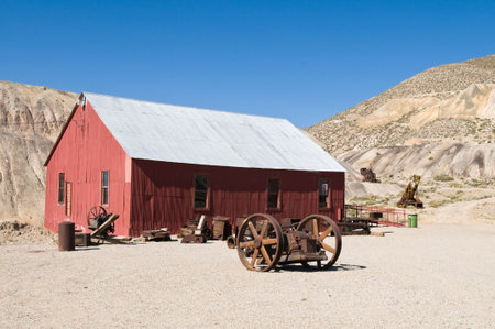 Mine building surrounded by equipment, Tonopah, Nevadaの写真素材