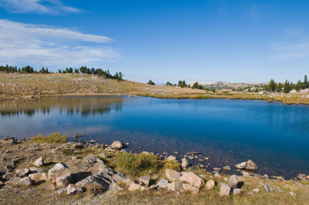 Lake in the Rocky Mountains near the entrance to Yellowstone National Park, Wyomingの写真素材