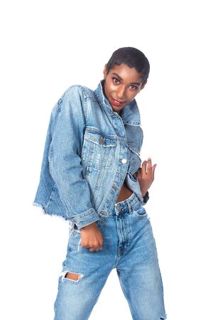 Slender young African American woman in distressed denimの写真素材
