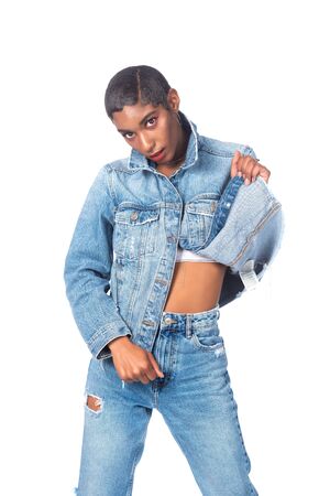 Slender young African American woman in distressed denimの写真素材