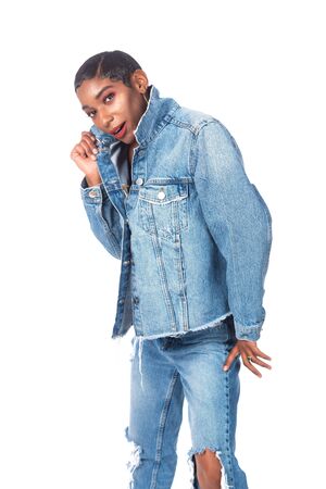 Slender young African American woman in distressed denimの写真素材