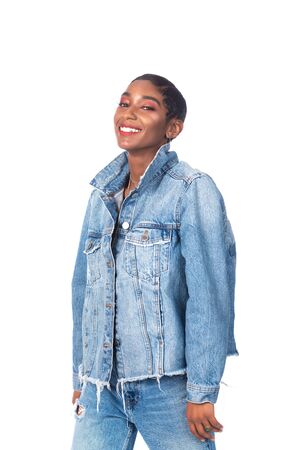 Slender young African American woman in distressed denimの写真素材