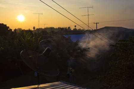 Thailand 7 December 2011: In countryside of Thailand, people use a satellite to receiver for watching tv. のeditorial素材