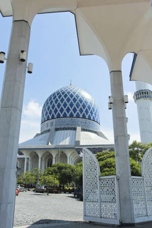 The beautiful Sultan Salahuddin Abdul Aziz Shah Mosque  also known as the Blue Mosque  located at Shah Alam, Selangor, Malaysia のeditorial素材