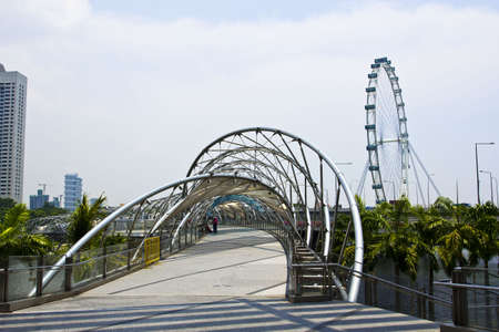 SINGAPORE - 8 October 2012  The Helix Bridge links the Marina Centre   Bayfront areas, completing the 3 5km long walking route around Marina Bay in Singapore のeditorial素材